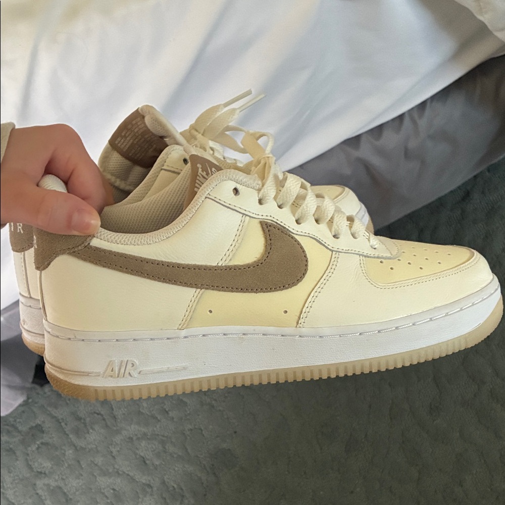 Nike Low-Top Sneakers in Cream with Tan Swoosh